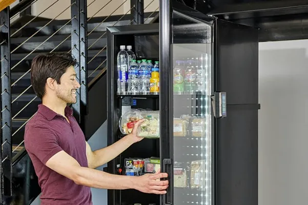 Open machine door revealing the products.